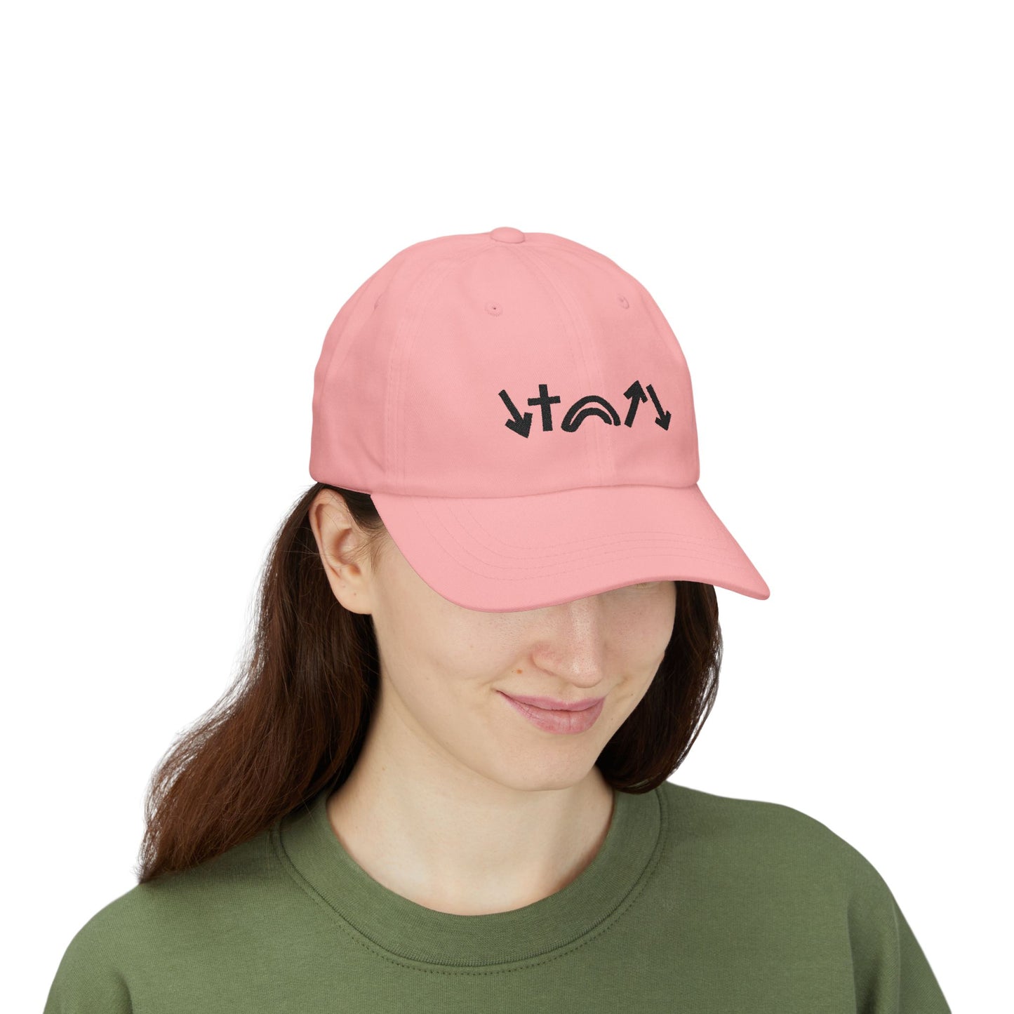 Person wearing a pink cap with black text on a white background