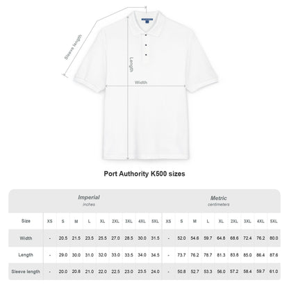 White shirt with measurement chart for Port Authority K500 sizes on a white background