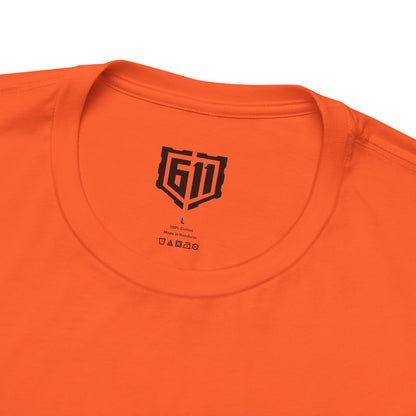 Close-up of an orange t-shirt with a black logo on the neck area.