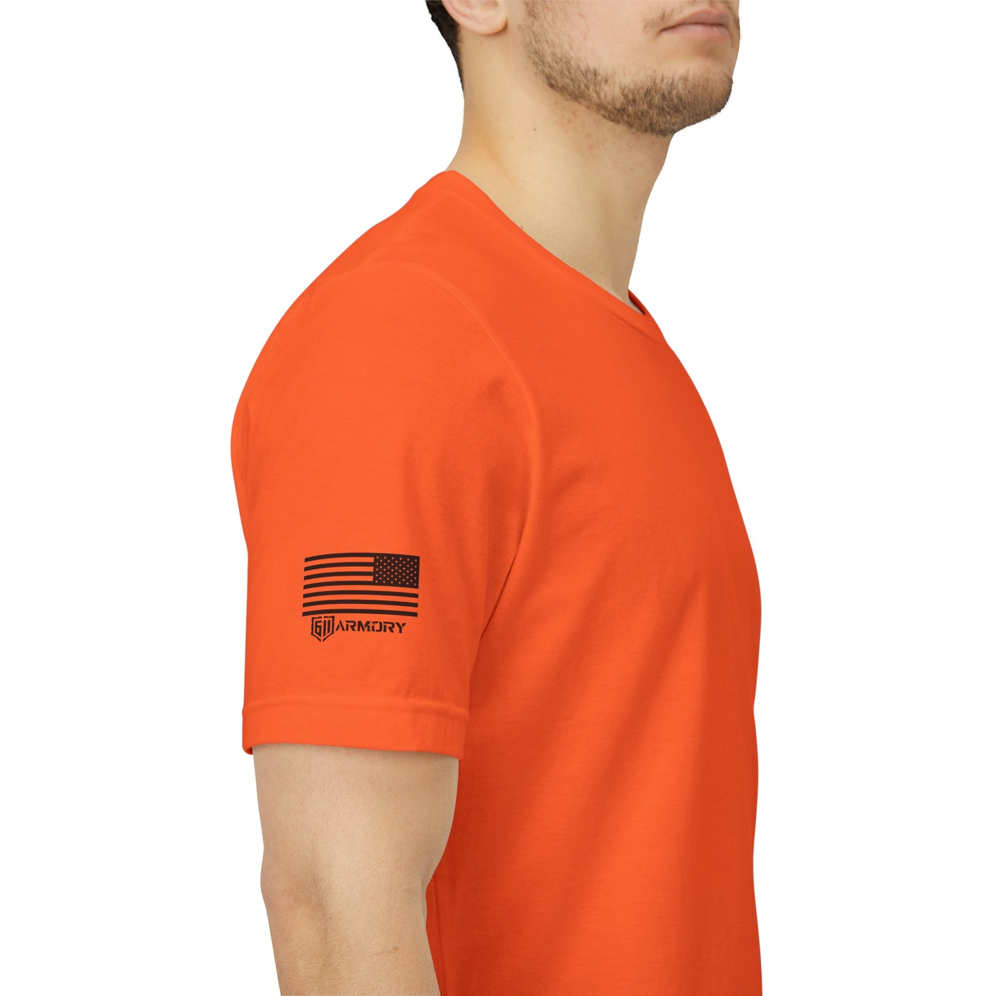 Orange t-shirt with a US Flag and logo on the sleeve against a white background