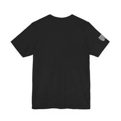 Raar of Black t-shirt with a small flag design on the sleeve against a white background