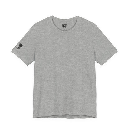 Gray t-shirt with a US Flag and small logo on the sleeve against a white background