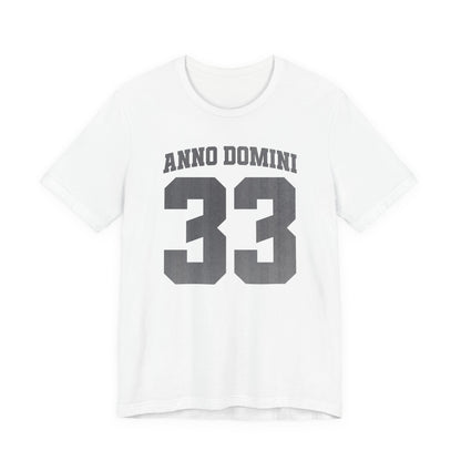 White t-shirt with 'Anno Domini 33' text on a white background