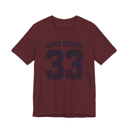 Maroon t-shirt with 'ANNO DOMINI 33' text on a white background