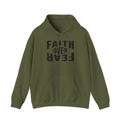 A green hoodie with the text 'FAITH OVER FEAR' printed in black on the front.