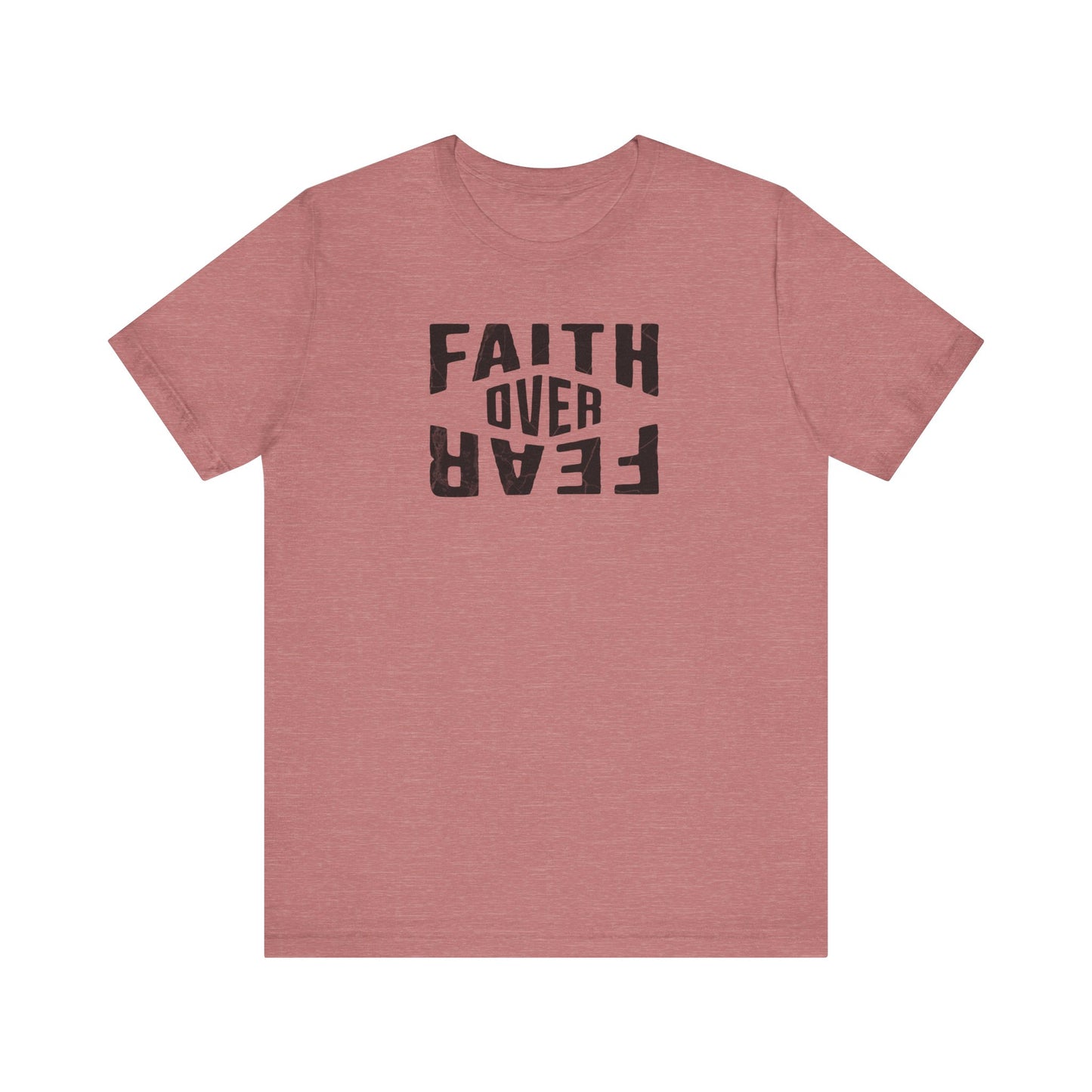 Pink t-shirt with 'Faith Over Fear' text on a white background