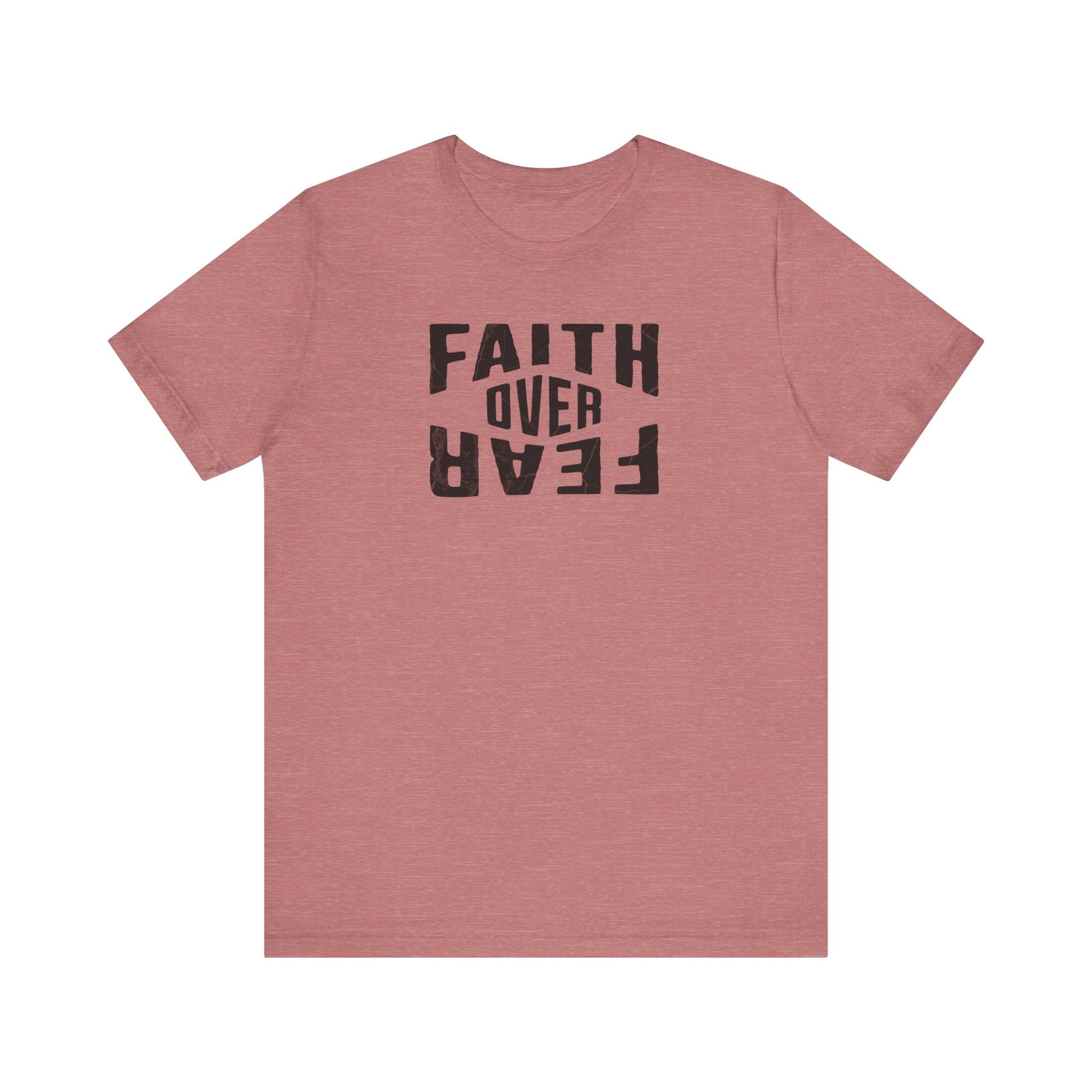 Pink t-shirt with 'Faith Over Fear' text on a white background