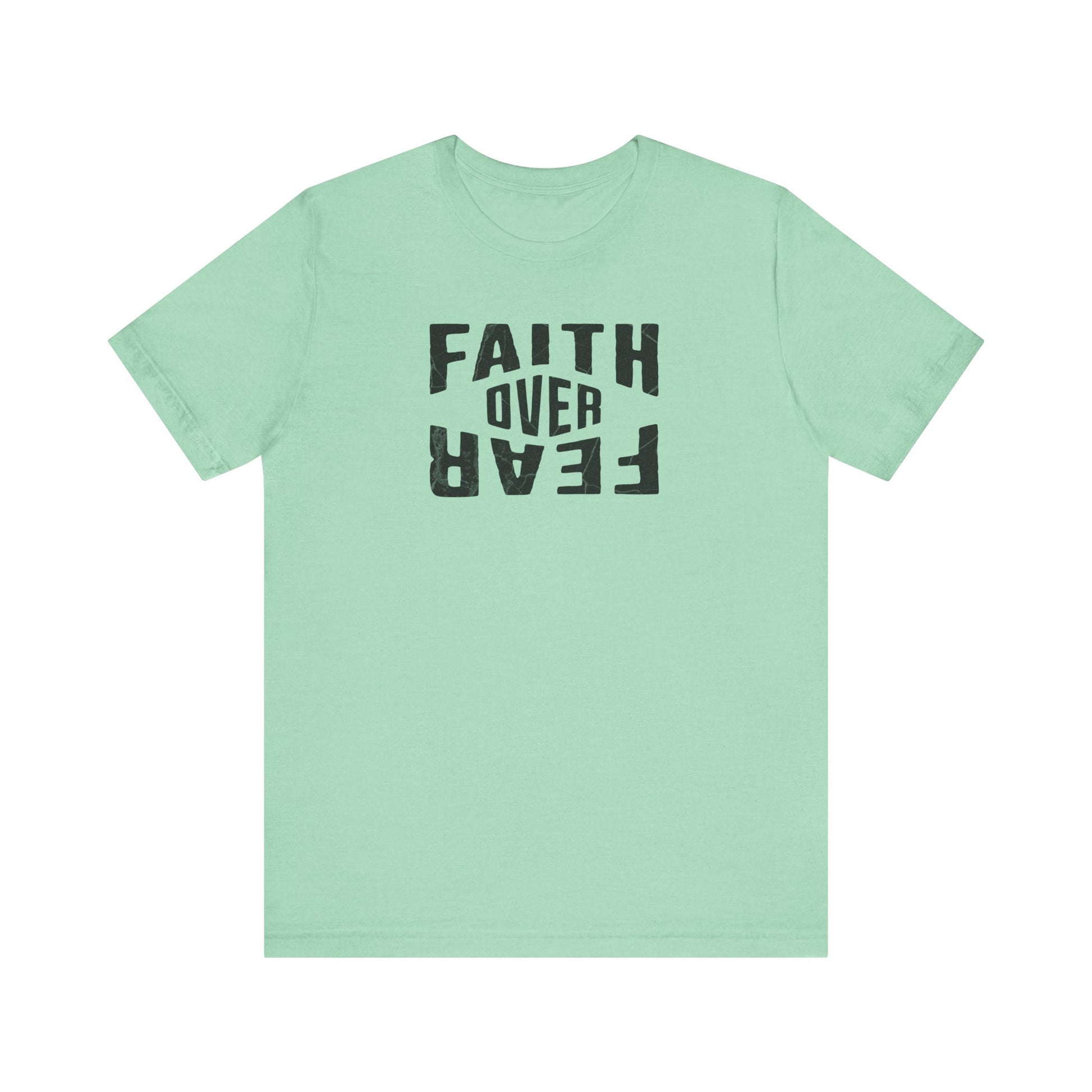 Light green t-shirt with 'Faith Over Fear' text on a white background