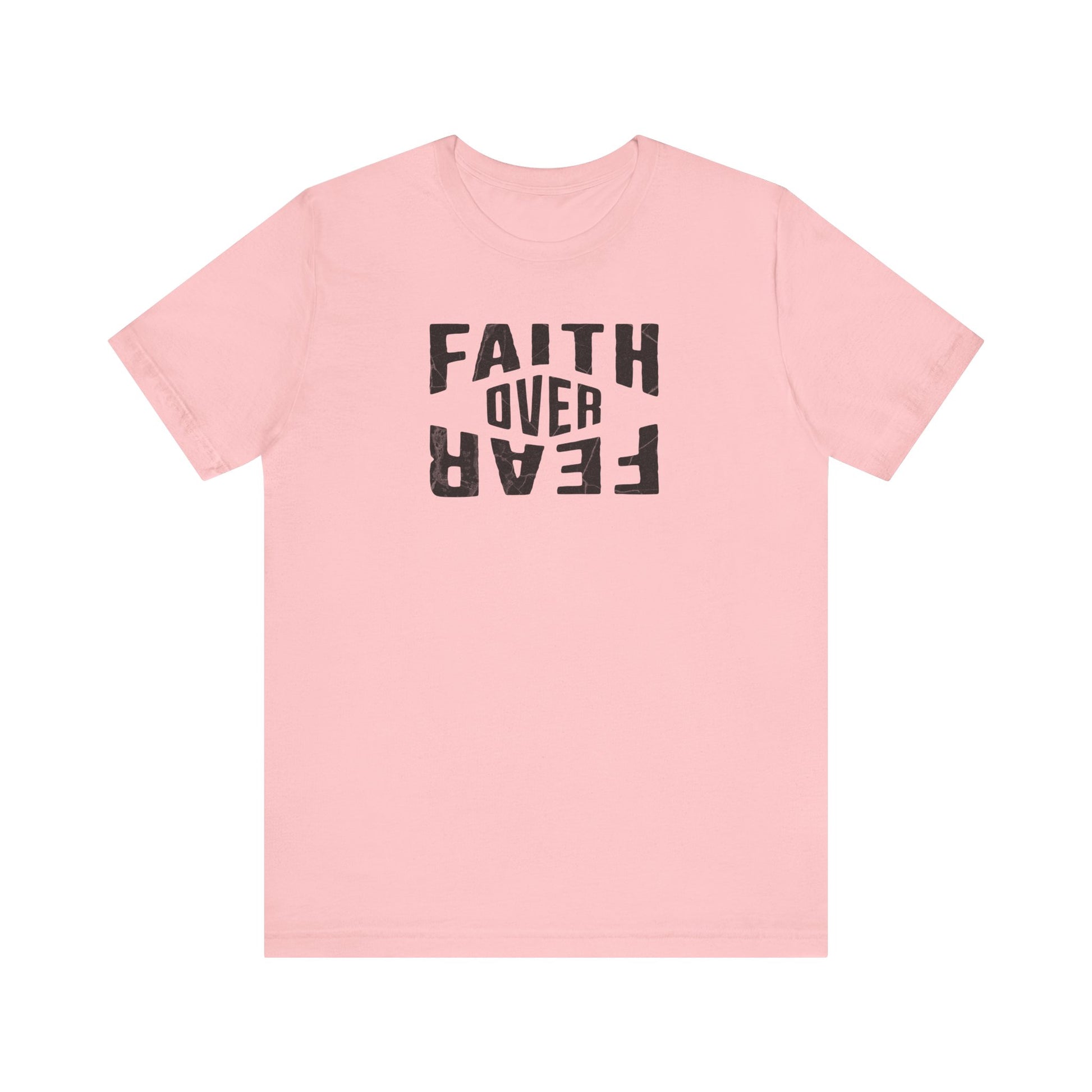 Pink t-shirt with 'Faith Over Fear' text on a white background