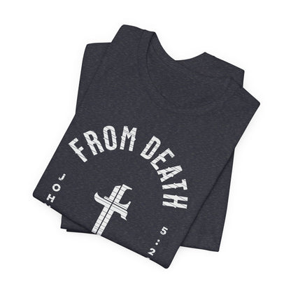 Stack of folded dark gray t-shirts with white text and logo on a white background
