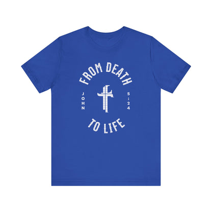 Blue t-shirt with white text and cross design on a white background