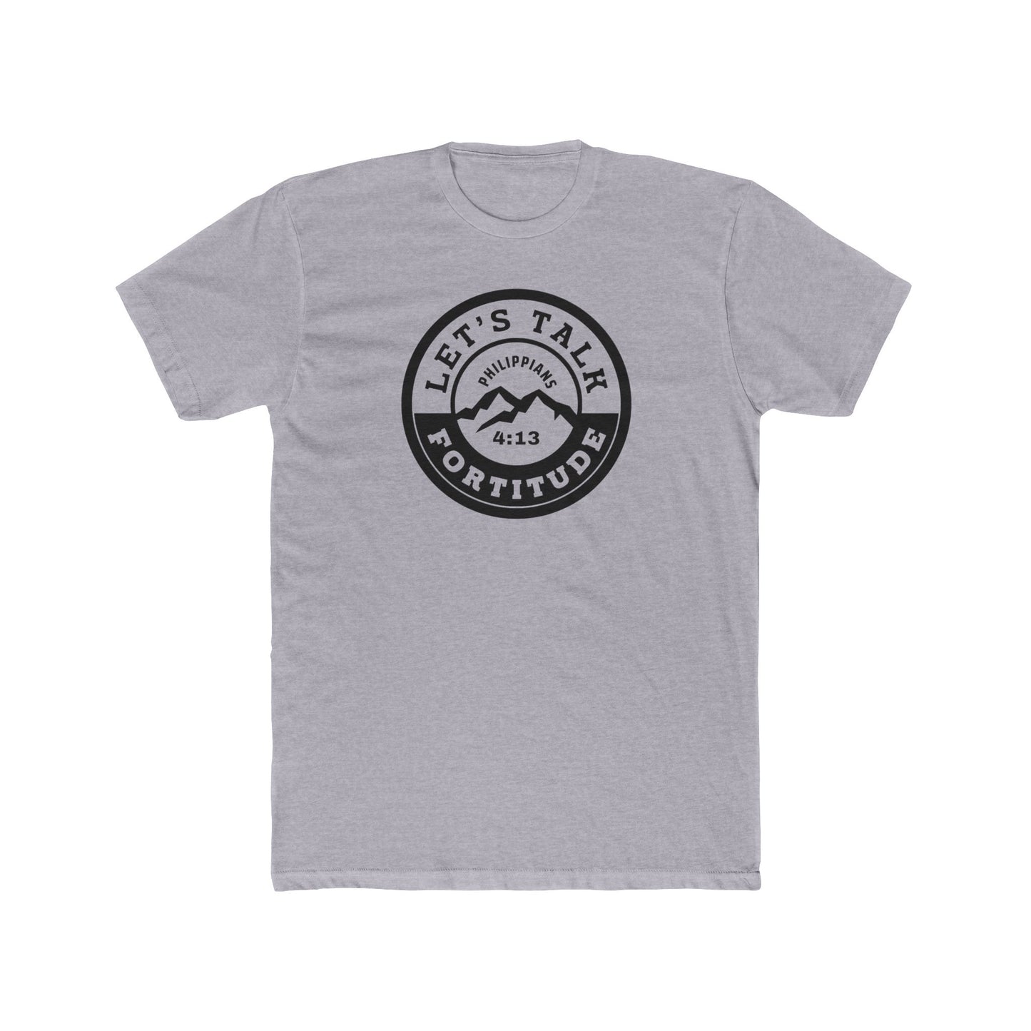 A beige t-shirt with a circular black logo print containing text and a mountain and sunset graphic in the center.
