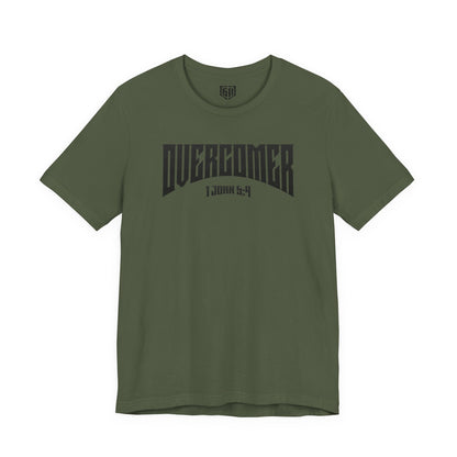 Green t-shirt with 'Overcomer' text on a white background