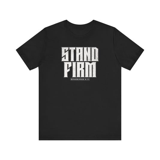 Black t-shirt with 'STAND FIRM' text on a white background